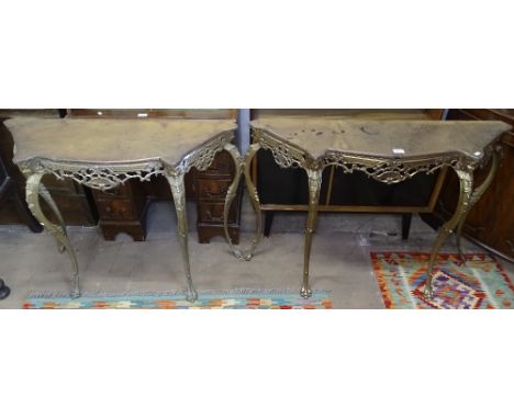 A pair of embossed gilt-metal console tables, with pressed steel tops, W108cm 