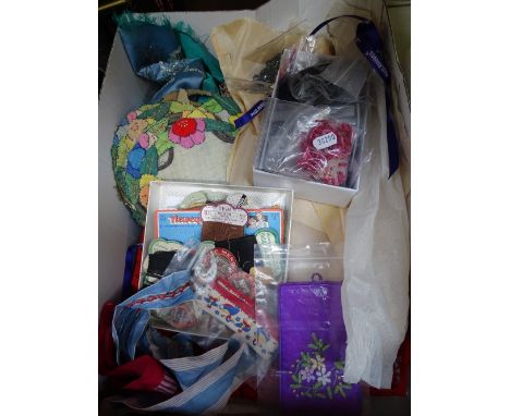 A box of Vintage sewing items, beads, table mats etc 