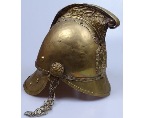 An Antique brass fireman's helmet 