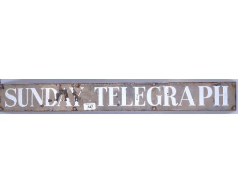 A Vintage enamelled Sunday Telegraph advertising sign, length 30" 