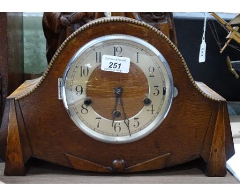 An oak-cased 3-train mantel clock 