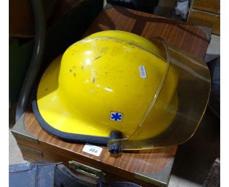 A Kent Fire Brigade helmet, and a brass-bound box 