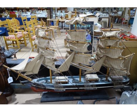 A model sailing ship on stand, length 32" 