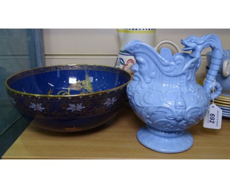 A Carlton Ware fruit bowl with a painted and gilded chinoiserie scene, a Victorian jug and a Poole Pottery jug, 7.25" 