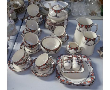 A 1930s Art Deco Crown Ducal tea service, including a teapot, milk jugs, egg cups etc 