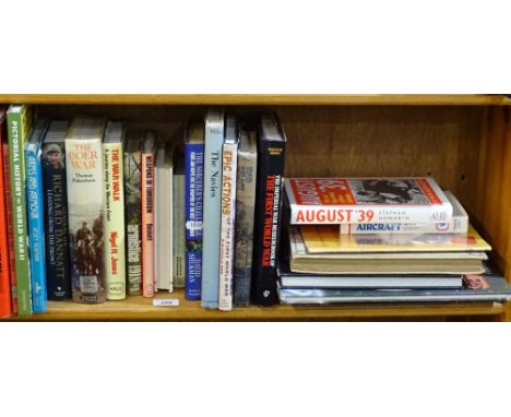 A shelf of military books 