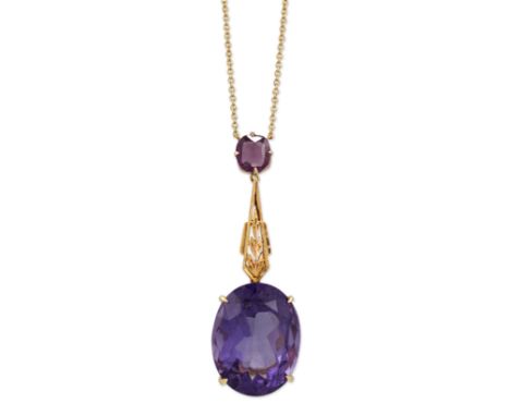 AN AMETHYST PENDANT NECKLACE, an oval-cut amethyst suspended from a pierced tapering bar to an amethyst surmount and an 18 ca
