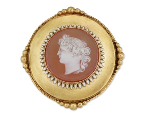 A CAMEO BROOCH, circular form and carved depicting a classical female head, within a white enamel leaf border and a circular 