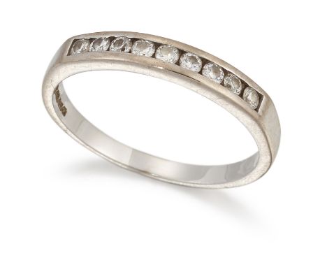 AN 18 CARAT WHITE GOLD DIAMOND HALF HOOP RING, channel set with round brilliant-cut diamonds. Estimated total diamond weight 