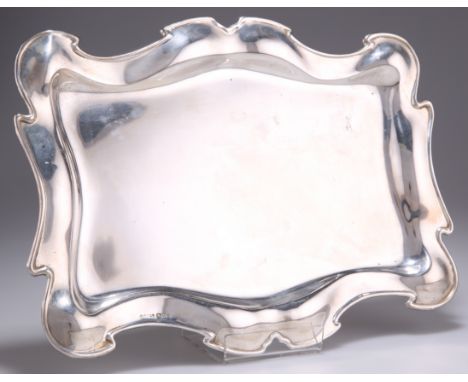 A GEORGE V SILVER DRESSING TABLE TRAY,&nbsp;by&nbsp;J &amp; R Griffin Ltd, Chester 1914, shaped rectangular. 30.5cm by 22.5cm