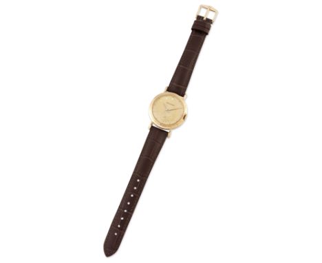 A 9CT GOLD JAEGER-LECOULTRE WATCH. Circular champagne dial with gilt sword hands and baton index, sub seconds dial at 6 o'clo