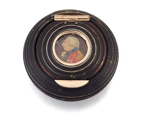 A STAINED IVORY PORTRAIT MINIATURE&nbsp;SNUFF BOX,&nbsp;turned circular form, the hinged lid with applied thumbpiece and inse