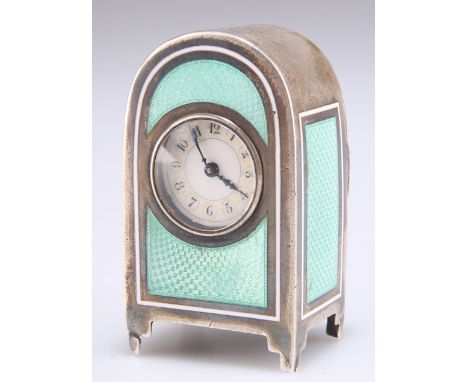 A SMALL CONTINENTAL GREEN ENAMEL CLOCK, unmarked, early 20th Century, with arch-top and green enamel to the front and sides, 