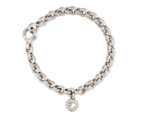 CHOPARD - A HAPPY DIAMOND BRACELET, belcher links suspending a heart shaped charm pendant, containing a floating round brilli