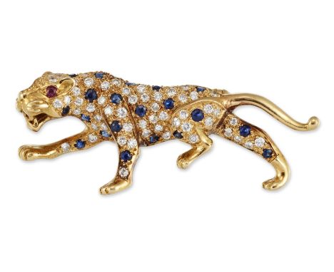 AN 18 CARAT GOLD SAPPHIRE, RUBY AND DIAMOND LEOPARD BROOCH, in walking pose,&nbsp;pavé-set with round brilliant-cut diamonds 