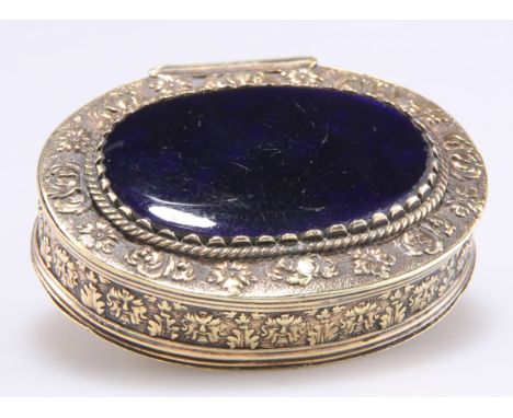 A GILT-METAL SNUFF BOX, LATE 17TH/EARLY 18TH CENTURY, oval, the hinged cover with inset cobalt blue enamel plaque within a bo