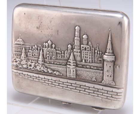 A RUSSIAN SILVER CIGARETTE CASE, rectangular, embossed with a view of a city to the cover, red 'stone' inset push-button, eng