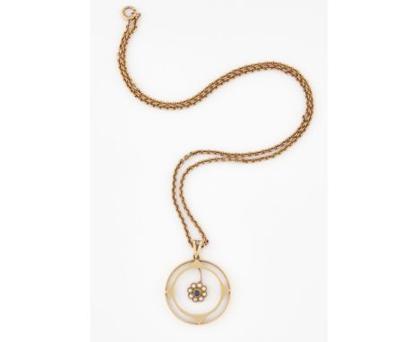 A SAPPHIRE AND SEED PEARL PENDANT ON CHAIN, a sapphire and seed pearl floral cluster suspended within a pierced knife-edge ci