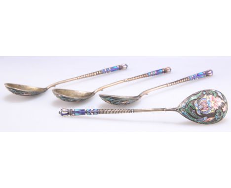 A SET OF FOUR RUSSIAN SILVER-GILT AND ENAMEL SPOONS, 1896-1908, oval bowls, the reverse of the bowls enamelled with flower an
