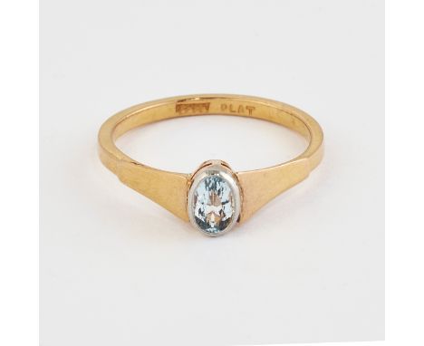 AN AQUAMARINE RING,&nbsp;an oval-cut aquamarine in a milgrain setting to tapering angular shoulders. Marked '22ct Plat', ring