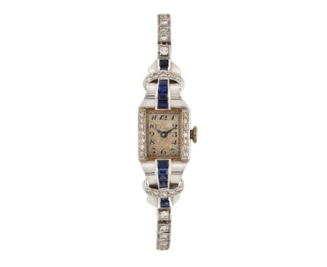 A SAPPHIRE AND DIAMOND COCKTAIL WATCH, CIRCA 1940S, the rectangular silvered dial with Arabic index and blued steel hands, th