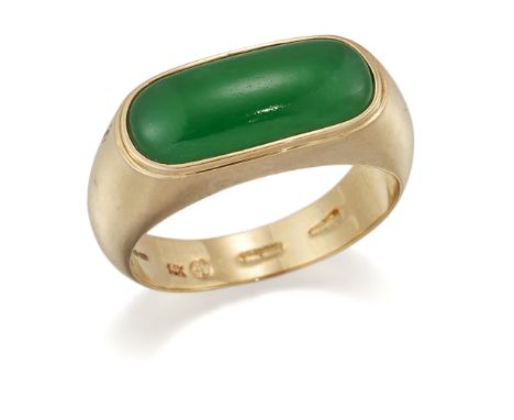 A 14 CARAT GOLD JADE RING, an oblong-cut jade in a closed back bezel setting, to a tapering shank. Hallmarked Edinburgh, ring