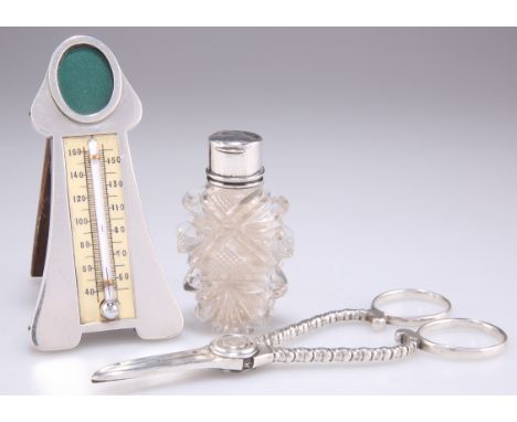 A GROUP, including a George V silver-mounted desk thermometer, by Lawrence Emanuel,&nbsp;Birmingham 1910; and a pair of Gorha