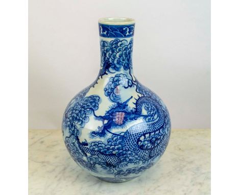 VASE, Chinese blue and white porcelain decorated with a dragon chasing the flaming pearl of wisdom, 33cm H. 