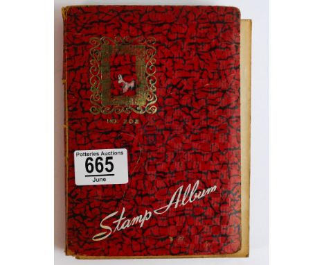 A stamp album containing English and foreign vintage stamps. 