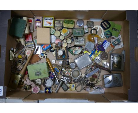A mixed collection of items to include vintage badges, cigarette cases , tin boxes etc 