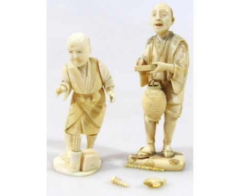 A Japanese Meiji period ivory figure, of a standing gentleman holding cylindrical basket, on a shaped base set with flower he