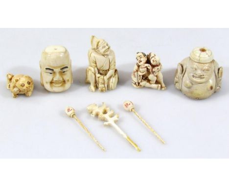 Various ivory and other carvings, early 20thC and later, to include a netsuke formed as a crouched animal, possibly a raccoon