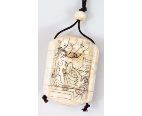 A 20thC erotic carved bone four sectional Japanese pill box netsuke, decorated with a fornicating couple in interior scenes, 