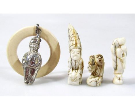 Early 20thC ivory, etc., to include an ivory and silver child's teething ring, 11cm high, miniature ivory figures, etc., all 