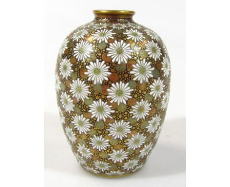 A Japanese late Meiji period satsuma vase, the shouldered body profusely decorated with flower heads on a gilt and black grou