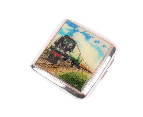 A silver and enamel cigarette case. Decorated with a square enamel PRINT of a steam train with the British and French flags. 