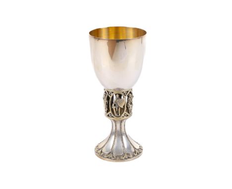 A limited edition silver Canterbury Cathedral goblet. The interior and decoration gilt, the stem pierced with six figures inc