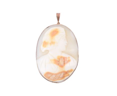 An early 20th century gold and shell cameo brooch. Carved with a female profile with brown highlights. Mount marked 9ct, 5.2c