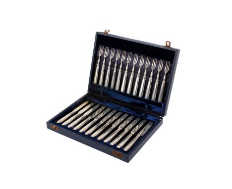 A cased set of twelve hallmarked solid silver fruit knives and forks. The handles and blades with hallmarks for Sheffield 194