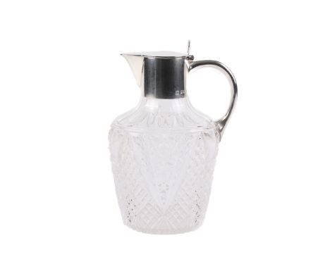 A late Victorian cut glass silver mounted claret jug. With hallmarks for R & W Sorley, London 1899. Height 21.5cm. 