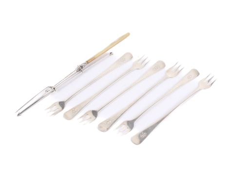 A set of six Victorian Scottish pickle forks and a mother-of-pearl handled example. The first with engraved monogram and hall