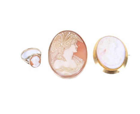 A vintage cameo ring and two brooches. One with a woman with an elaborate headdress, the mount marked K14, 5.1cm x 3.8cm, the