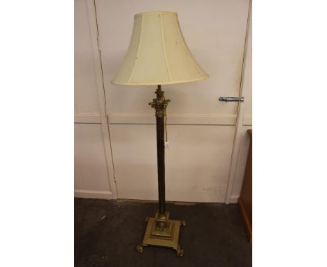 A large brass Corinthian column standard lamp and shade,&nbsp;164cm high overall