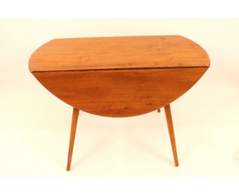 An light Ercol drop leaf kitchen table, raised on tapering supports, 106cm x 121cm