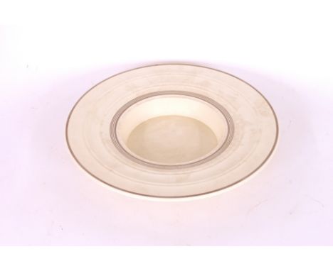 Keith Murray for Wedgwood, broad rimmed cream and silver lustre decorated dish, 36cm dia.