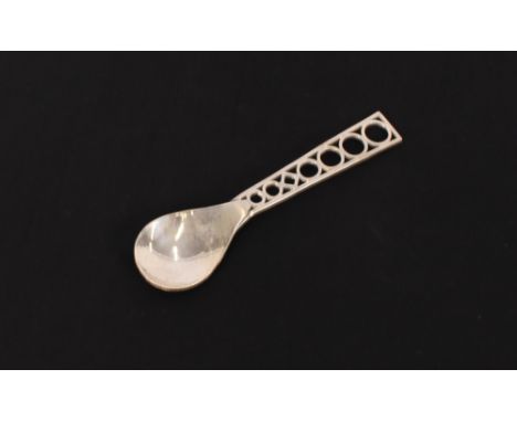 A 20th Century hand forged silver caddy spoon, with linked design handle and pear shaped bowl, Birmingham 1968, makers mark T