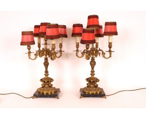 A pair of Rococo design five light table lamps, raised on marble bases, 68cm high