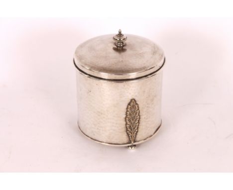 An Arts &amp; Crafts hand planished silver plated biscuit barrel,&nbsp;marks to base, numbered 1663, possibly by A. &amp; E. 