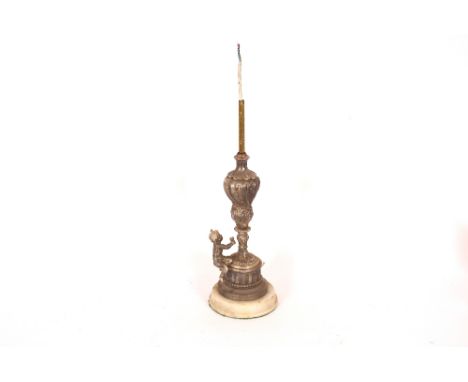 A silvered Spelter lamp base, with cherub decoration, 40cm high