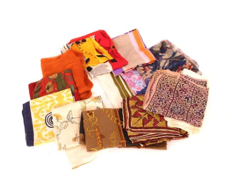 A collection of various vintage silk scarves